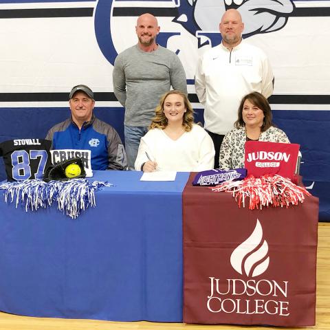 Shown from left, front: father, Scott Stovall; Sarah Stovall; and mother, Sandra Stovall. Back row: Carbon Hill Coach Wade Tittle and Judson Coach Tom Hannah.