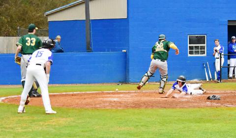 Casey Page (18) is shown scoring a run for Bevill during the first game of a doubleheader against Motlow State Community College on Saturday, Feb. 16. Also shown is Walker Nolan (15) and Spencer Hughes (5) for the Bears.