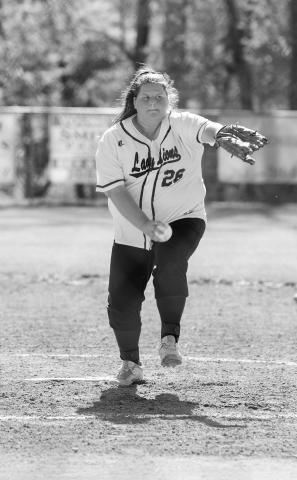 Emma Nichols is shown pitching for Hubbertville.