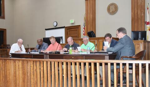 Pictured at the June 14 Fayette County Commission meeting, from left: Commissioners Joe Acker, John Underwood, Robert Townley, Wesley Jacobs, Barry Corkren, Shane Hughes and Commission Chairman Mike Freeman.