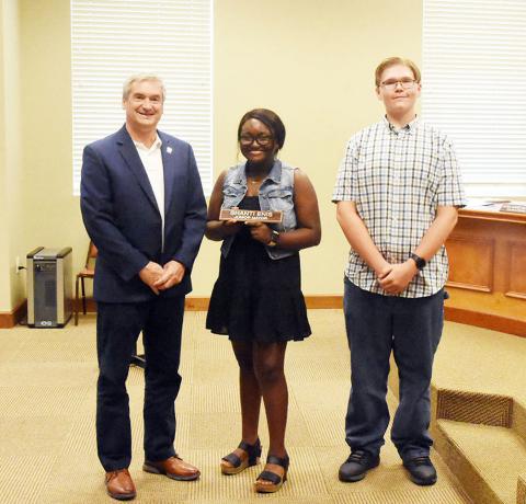 Shown from left: Fayette Mayor Rod Northam is shown with outgoing Junior City Council Mayor Shanti Enis and incoming Junior City Council Mayor Benjamin Olive.