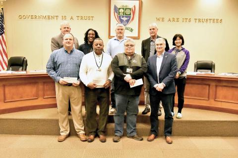 Shown receiving $5,000 appropriation checks from the Fayette City Council are from left, front: Fayette Elementary Principal Matthew Lindsey, Fayette Middle School Principal Ron Hannah and FCHS Assistant Principal Dan Gonzalez with Fayette Mayor Rod Northam. Back: Council members Tommy Williams, Aliska Hughes-Monroe, Jerry Nichols, Eddy Campbell and Fayette Junior Mayor Emily Huang.