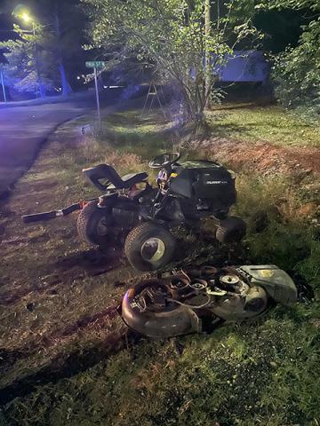 The damaged lawnmower that Henderson was riding