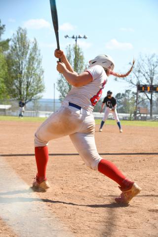 Alivia Morrison delivers a three-run double against Hubbertville on March 21. 