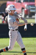 Austin McCaleb is shown getting a hit against Winfield.