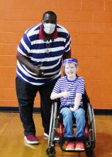 Pictured is Nathan Jacobs of Berry with Quinton Aaron following the program at Fayette Co. High School.