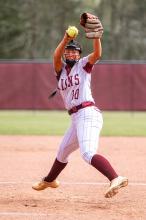 Hub’s Nevaeh Hoobler pitching on the mound for the Lady Lions. | Photo by Leah Hollingsworth
